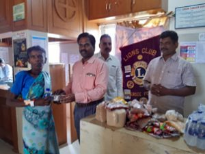 Dr.K.Velavan with Lions club reaching out to poor patients .